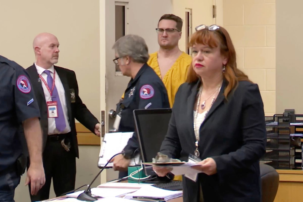 This image taken from video shows Michael David McKee walking into the courtroom on Monday, Jan. 12, 2026, in Rockford, Ill. (WIFR News/Pool Photo via AP)