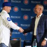 New Chicago Cubs infielder Alex Bregman, left, shakes hands with Chicago Cubs president of baseball operations Jed Hoyer at a news conference in Chicago, on Thursday, Jan. 15, 2026. (AP Photo/Nam Y. Huh)