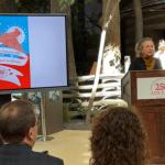 Gabrielle Lyon, Ph.D., chair of the Illinois 250 Coalition, unveils a "Passport to Illinois" Wednesday, February 11, at the Abraham Lincoln Presidential Library and Museum.