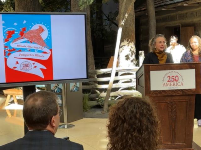 Gabrielle Lyon, Ph.D., chair of the Illinois 250 Coalition, unveils a "Passport to Illinois" Wednesday, February 11, at the Abraham Lincoln Presidential Library and Museum.