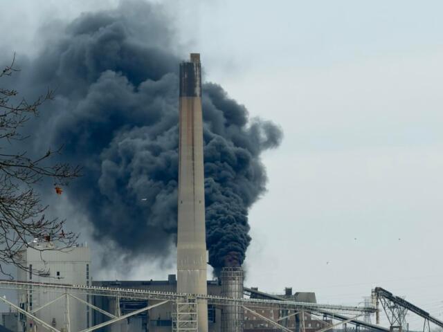 Fire and thick black smoke can be seen coming from a smokestack at CWLP Tuesday morning.