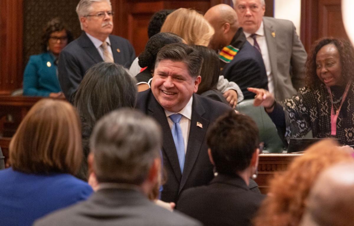 Gov. JB Pritzker enters the House chamber for his 2025 budget address. (Capitol News Illinois file photo by Andrew Adams)