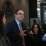 National Immigrant Justice Center attorneys Mark Fleming and Keren Zwick, right, and ACLU of Illinois attorney Michelle García speak to reporters at the Dirksen Federal Courthouse in downtown Chicago after a Feb. 13, 2026, hearing on warrantless immigration arrests amid Operation Midway Blitz. (Capitol News Illinois photo by Maggie Dougherty)