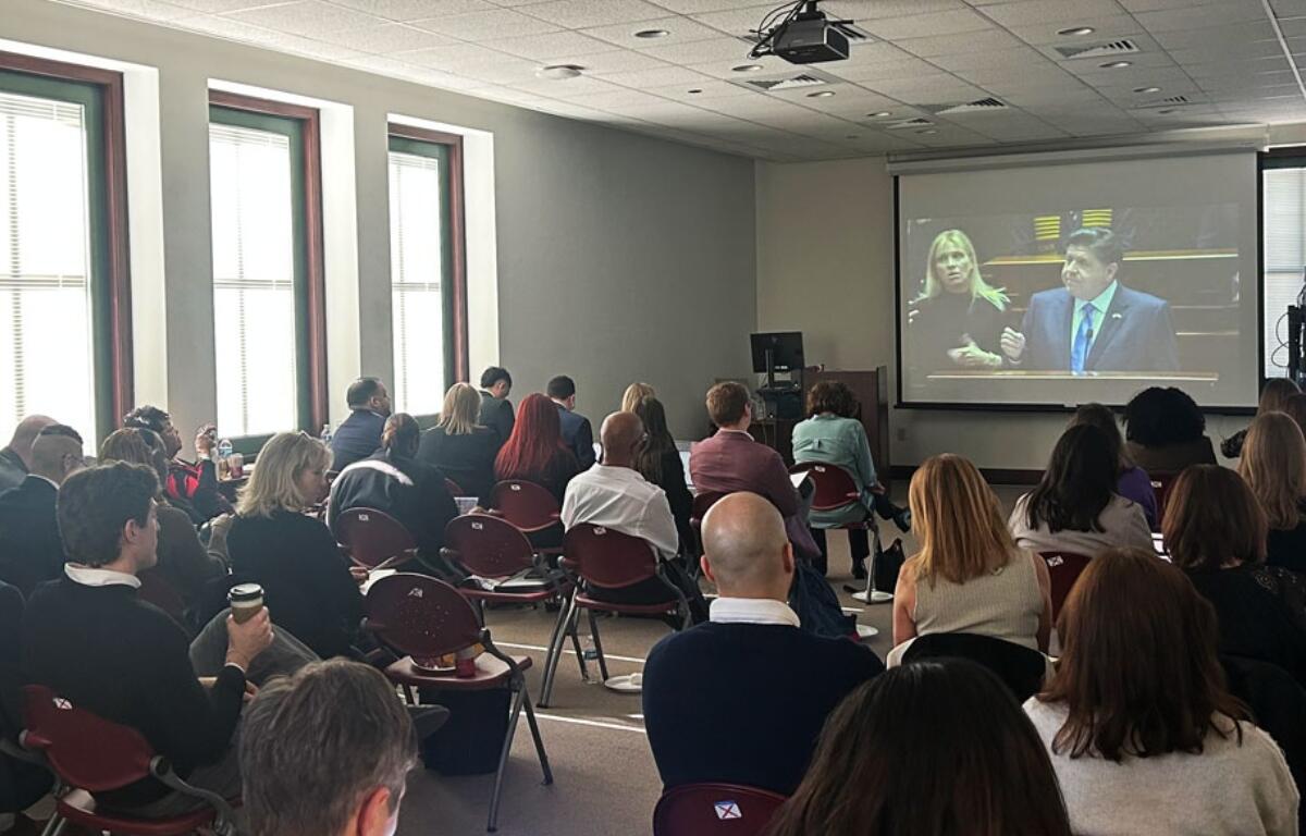 Lobbyists with a variety of health and human service organizations across Illinois watch Gov. Pritzker’s annual budget address at the Illinois State Library Wednesday, Feb. 18, 2026. (Medill Illinois News Bureau by George Alexandrakis)