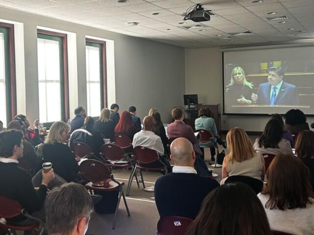 Lobbyists with a variety of health and human service organizations across Illinois watch Gov. Pritzker’s annual budget address at the Illinois State Library Wednesday, Feb. 18, 2026. (Medill Illinois News Bureau by George Alexandrakis)