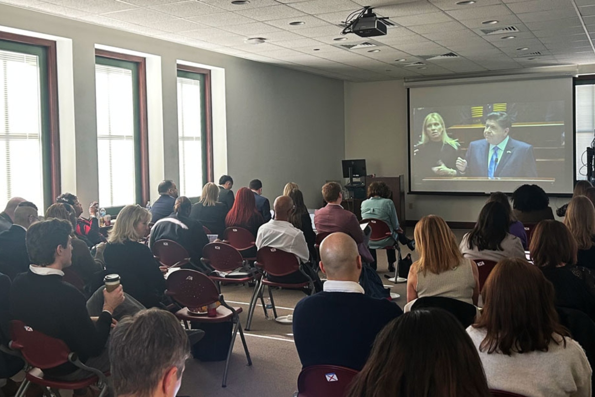 Lobbyists with a variety of health and human service organizations across Illinois watch Gov. Pritzker’s annual budget address at the Illinois State Library Wednesday, Feb. 18, 2026. (Medill Illinois News Bureau by George Alexandrakis)