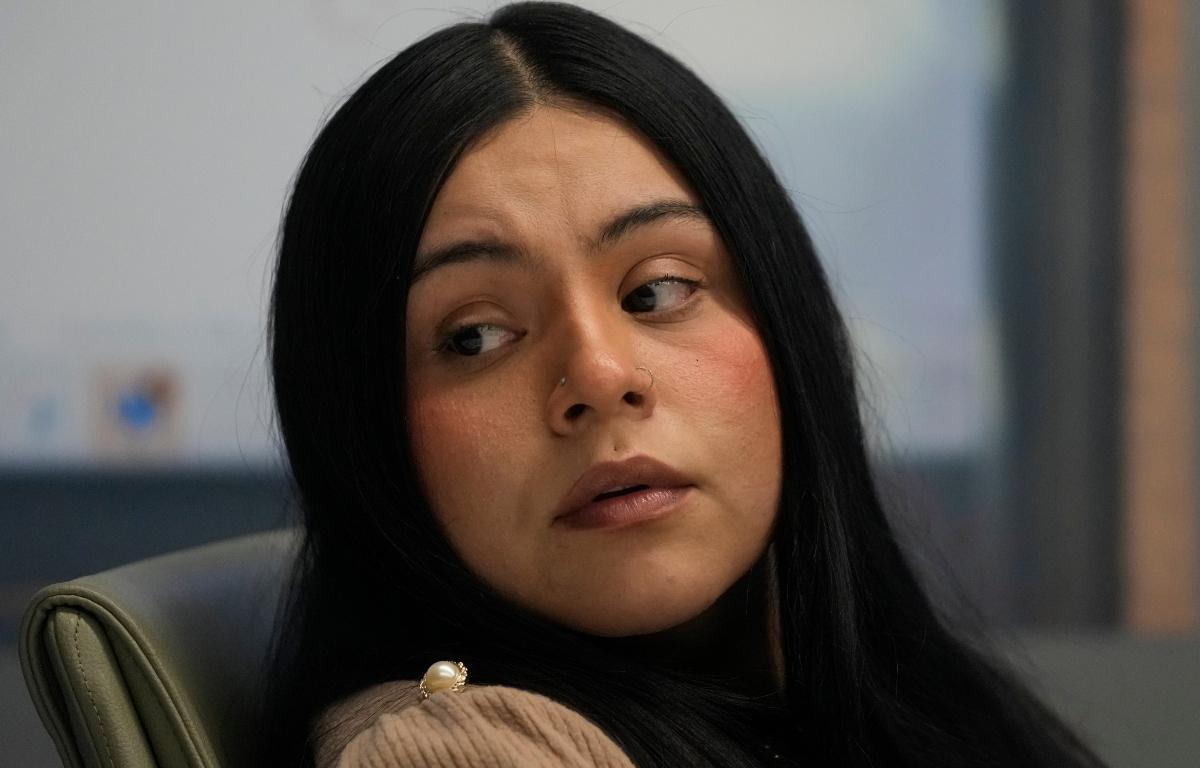 Marimar Martinez, a woman who was shot by a Border Patrol agent last year, sits with her attorneys during a press conference Wednesday, Feb. 11, 2026, in Chicago. (AP Photo/Erin Hooley)