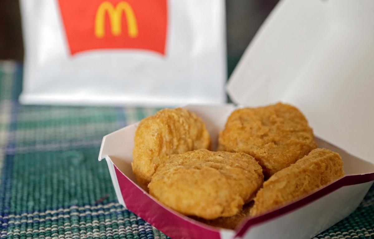 FILE - In this March 4, 2015, file photo, an order of McDonald's Chicken McNuggets is displayed for a photo in Olmsted Falls, Ohio. (AP Photo/Mark Duncan, File)