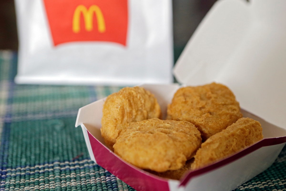 FILE - In this March 4, 2015, file photo, an order of McDonald's Chicken McNuggets is displayed for a photo in Olmsted Falls, Ohio. (AP Photo/Mark Duncan, File)