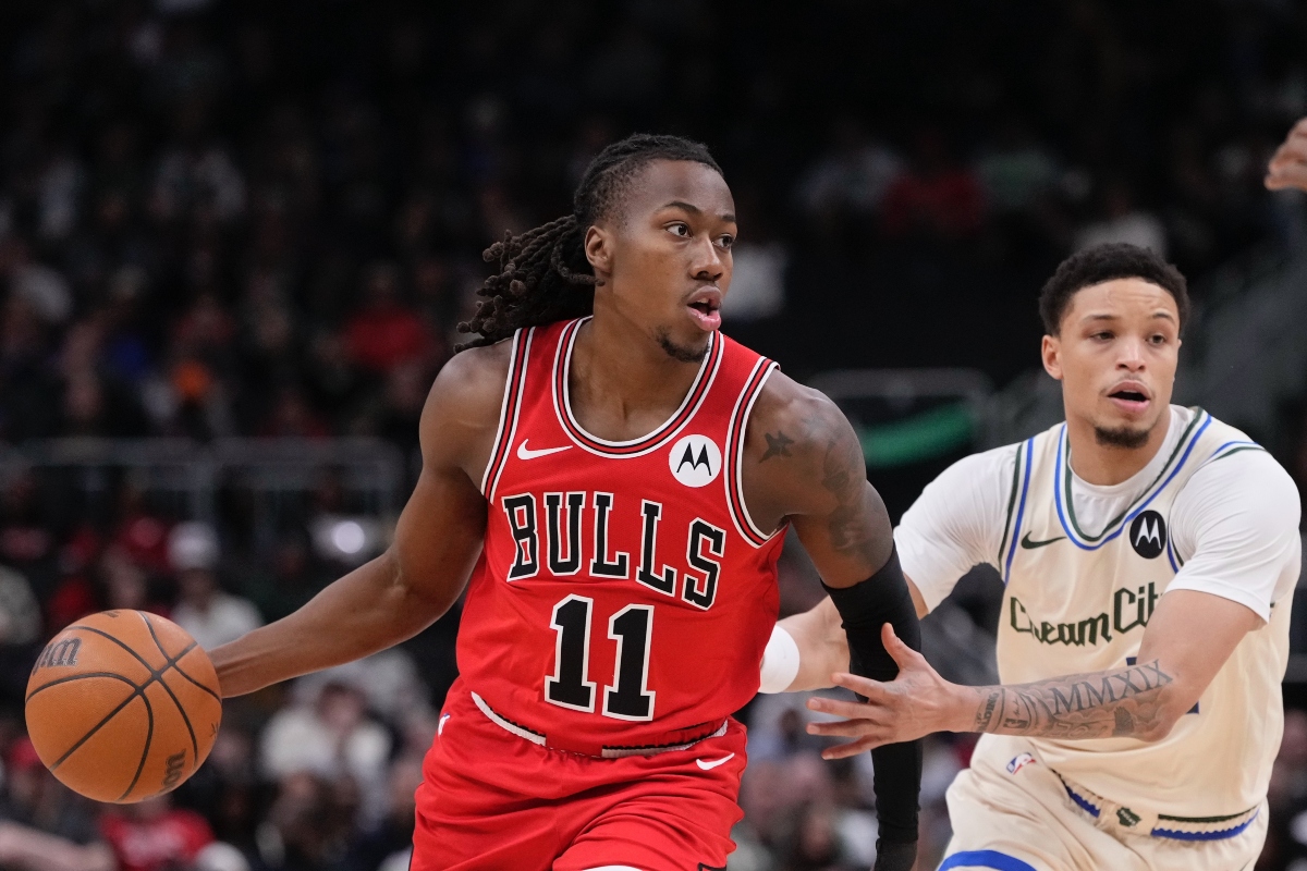 Chicago Bulls' Ayo Dosunmu gets past Milwaukee Bucks' Amir Coffey during the first half of an NBA basketball game Tuesday, Feb. 3, 2026, in Milwaukee. (AP Photo/Morry Gash)