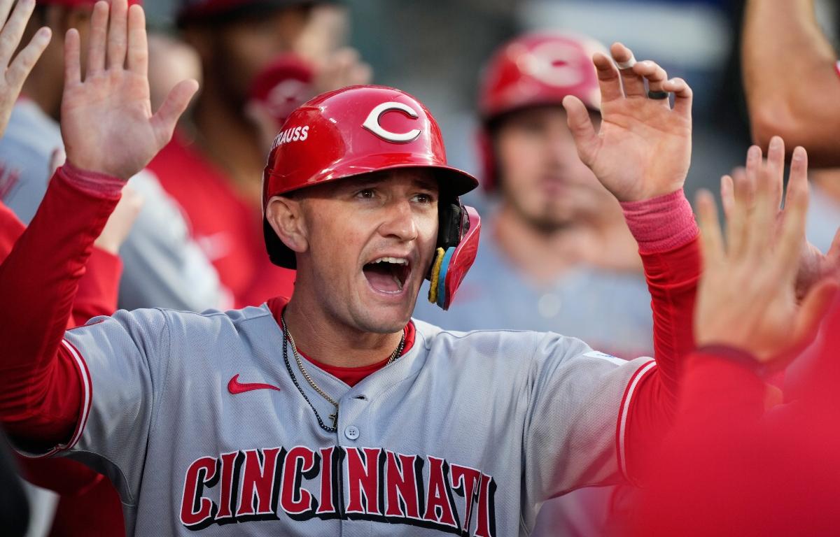 FILE - Cincinnati Reds' Austin Hays celebrates after scoring on a single from Sal Stewart during the first inning in Game 2 of the National League Wild Card baseball playoff series against the Los Angeles Dodgers, Oct. 1, 2025, in Los Angeles. (AP Photo/Mark J. Terrill, File)