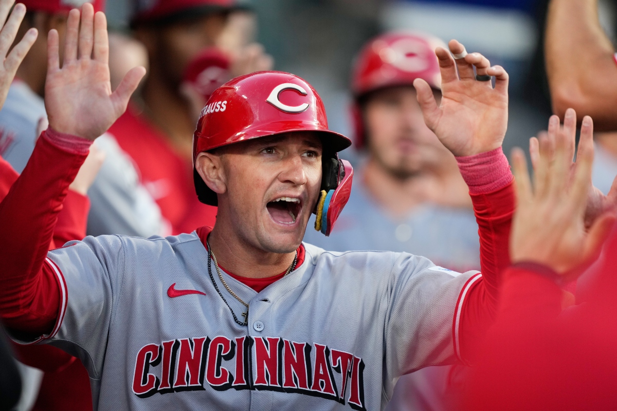 FILE - Cincinnati Reds' Austin Hays celebrates after scoring on a single from Sal Stewart during the first inning in Game 2 of the National League Wild Card baseball playoff series against the Los Angeles Dodgers, Oct. 1, 2025, in Los Angeles. (AP Photo/Mark J. Terrill, File)