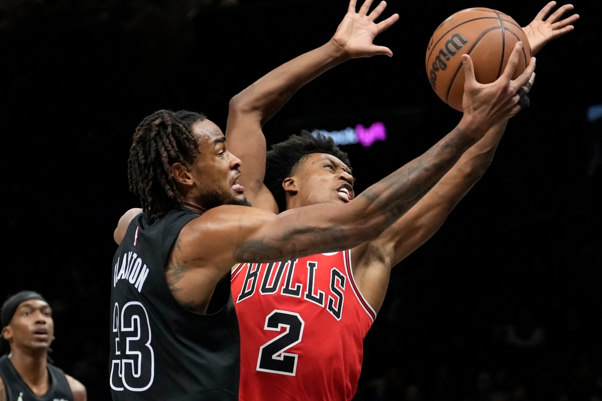 Brooklyn Nets center Nic Claxton (33) shoots over Chicago Bulls guard Collin Sexton (2) during the second half of an NBA basketball game, Monday, Feb. 9, 2026, in New York. (AP Photo/Yuki Iwamura)