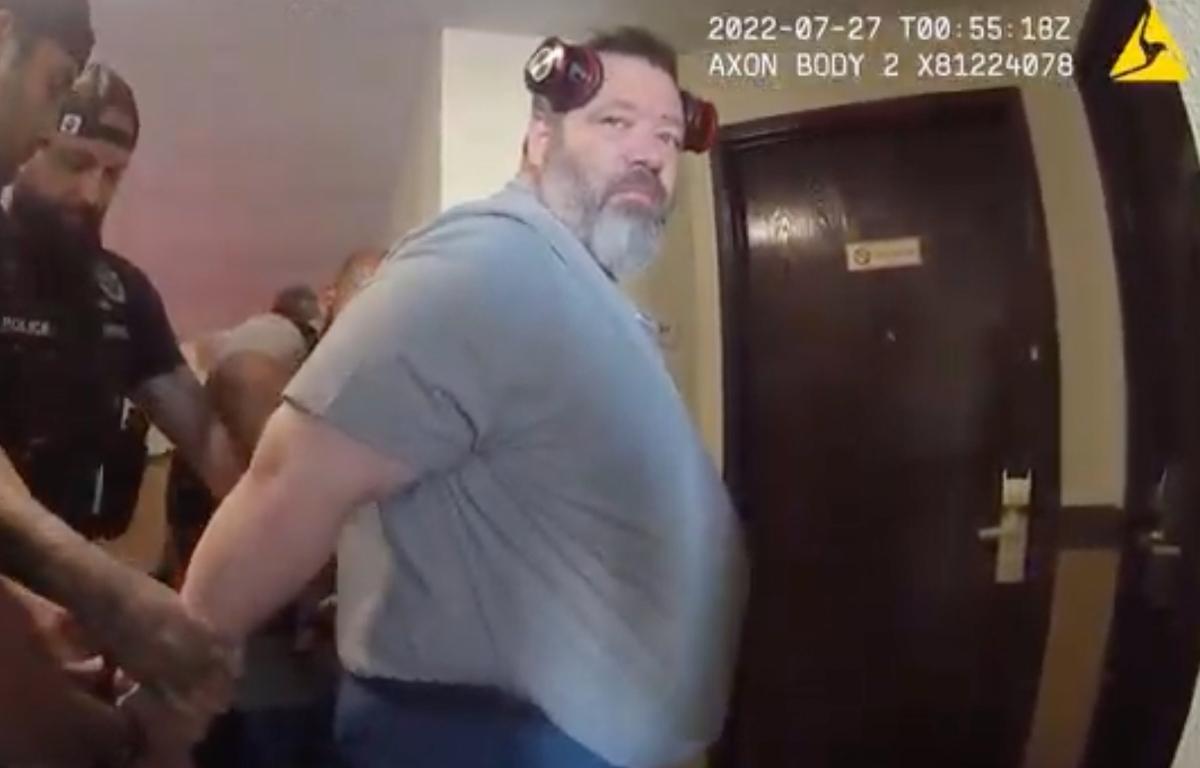 In this screengrab made from body camera footage provided by the Othello, Wash., Police Department, police officers arrest U.S. Immigration and Customs Enforcement supervisor Koby Williams in July 2022 during an underage sex sting operation. (Othello Police Department via AP) Screenshot