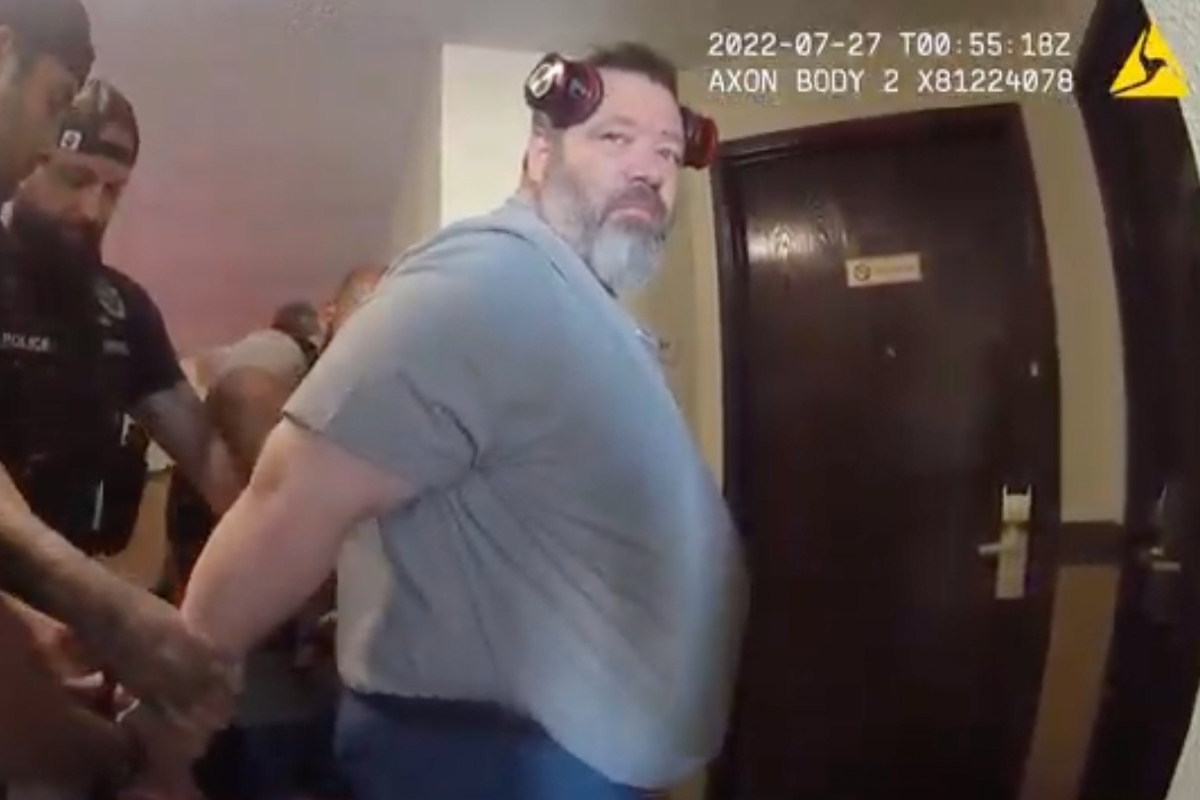 In this screengrab made from body camera footage provided by the Othello, Wash., Police Department, police officers arrest U.S. Immigration and Customs Enforcement supervisor Koby Williams in July 2022 during an underage sex sting operation. (Othello Police Department via AP) Screenshot