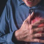 Man holding his chest