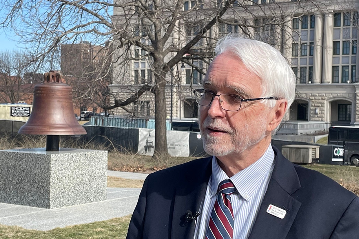 Timothy Killeen, president of the University of Illinois System, speaks to reporters outside of the Illinois State Capitol in Springfield. (Capitol News Illinois photo by Andrew Campbell)
