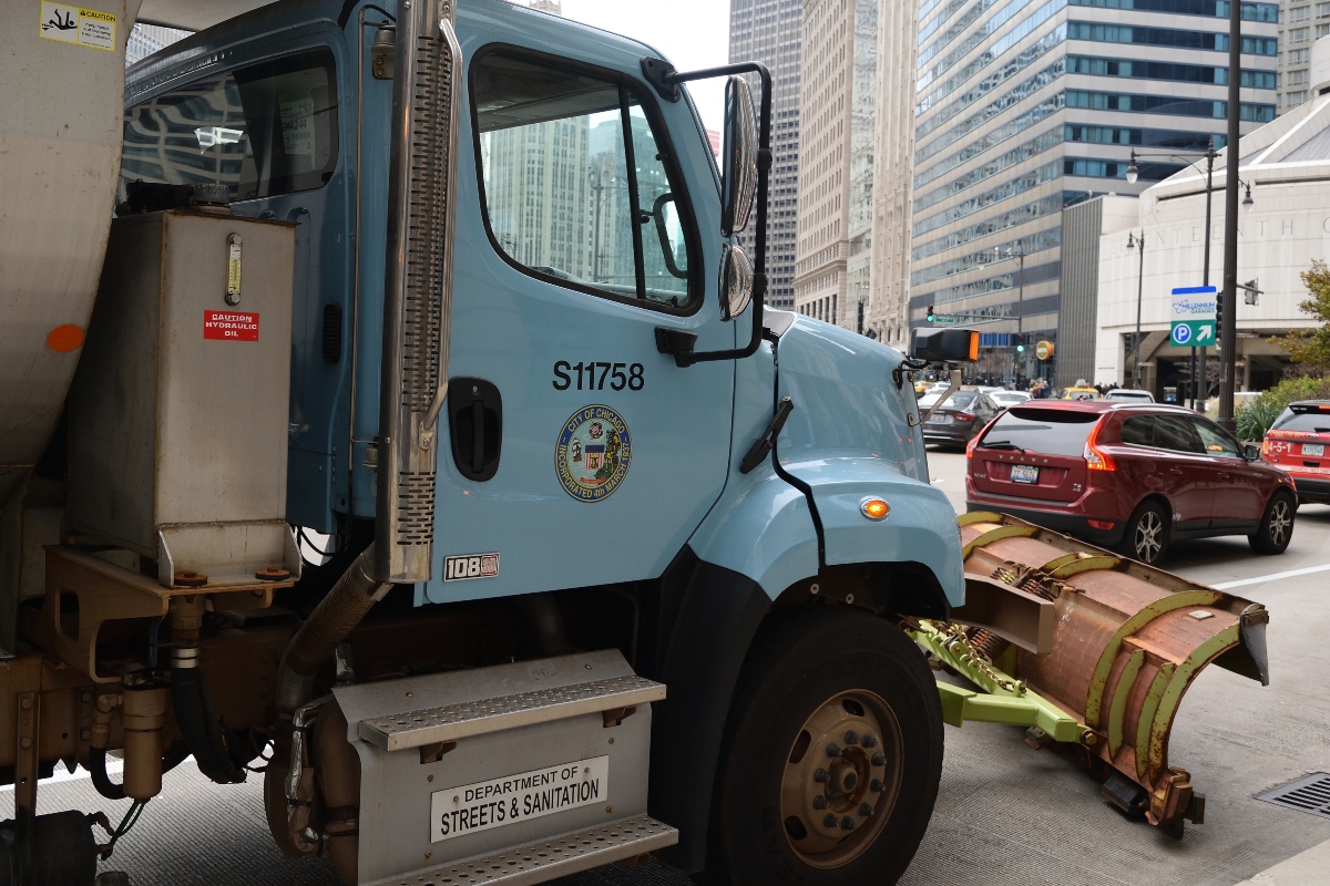 CHICAGO, ILLINOIS - NOVEMBER 24: Chicago Streets and Sanitation snow plow blocks access to State street before Thanksgiving parade route, November 24, 2016 in Loop.