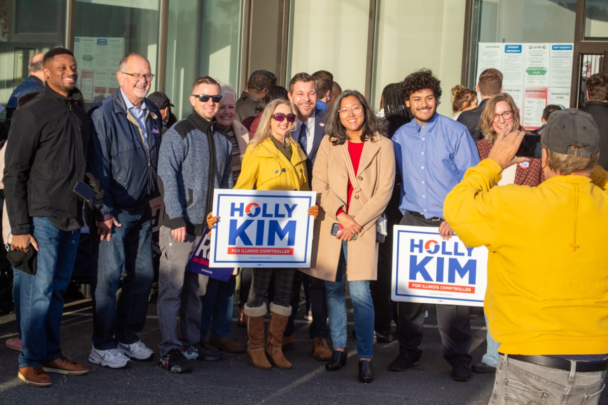 Lake County Treasurer Holly Kim stands with supporters outside the Illinois State Board of Elections in Springfield on petition filing day on Oct. 27, 2025. (Capitol News Illinois photo by Jerry Nowicki)