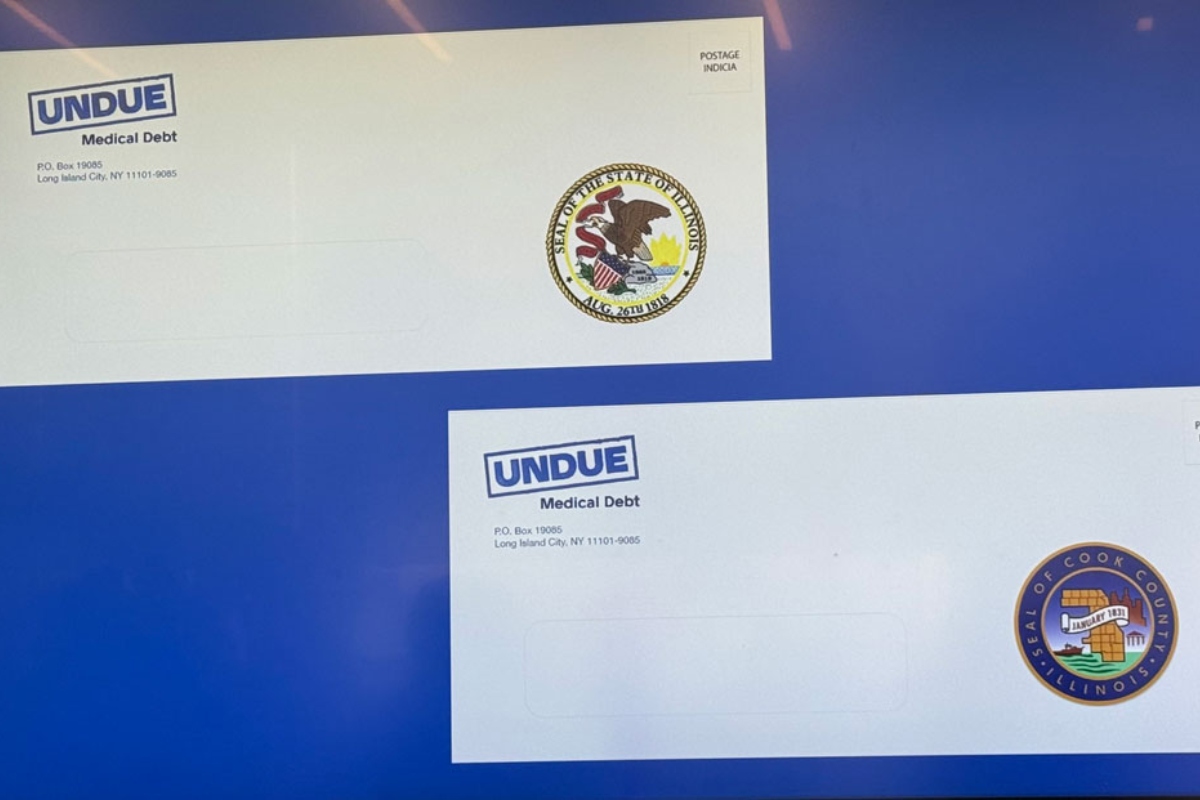 An example of the envelope mailed to eligible Illinois residents notifying them that their medical debt has been eliminated. (Medill Illinois News Bureau photo by Kaitlin Bender-Thomas)