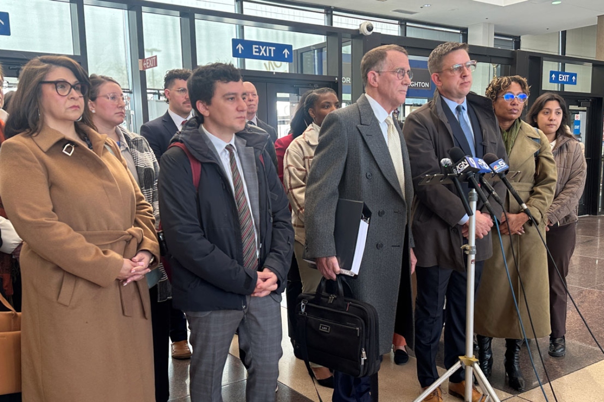 Locke Bowman and Steve Art, partners at Chicago-based civil rights law firm Loevy & Loevy, speak to reporters in the Cook County criminal courthouse on Tuesday, March 24, 2026. (Capitol News Illinois photo by Hannah Meisel)