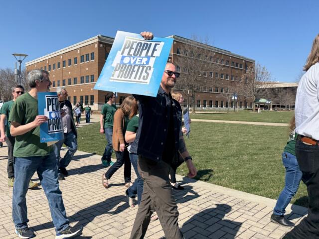 Faculty at the University of Illinois Springfield took what they called a "practice" walk around the quad Thursday in anticipation of needing to do so for a strike.