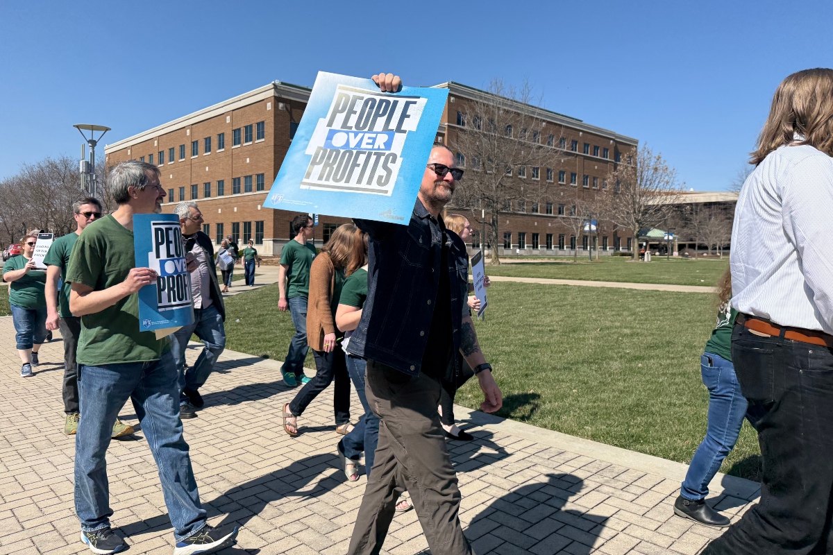 Faculty at the University of Illinois Springfield took what they called a "practice" walk around the quad Thursday in anticipation of needing to do so for a strike.