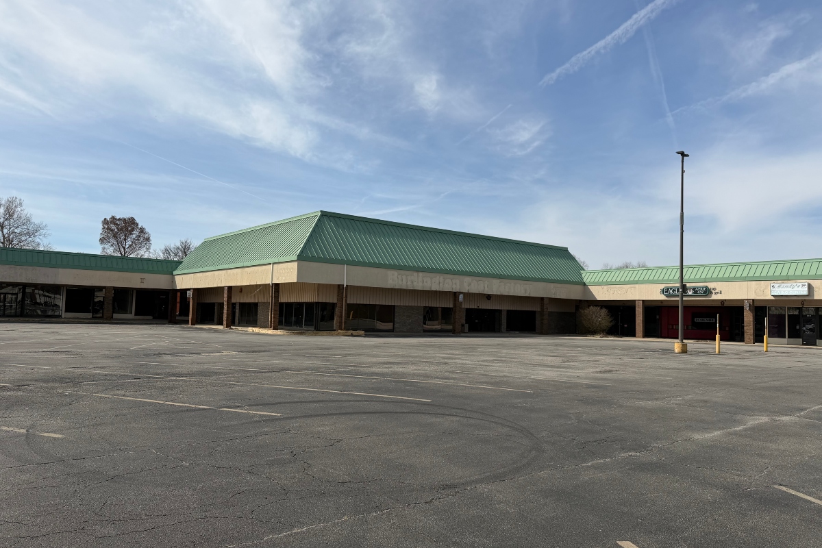 The Town & Country Shopping Center on MacArthur Blvd. has a new owner.