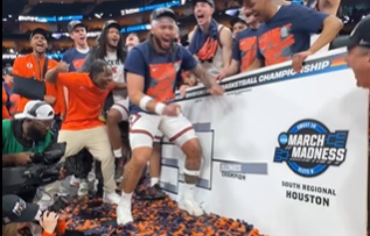 The Fighting Illini men's basketball team celebrate their advancement to the Final Four after defeating Iowa Saturday night.