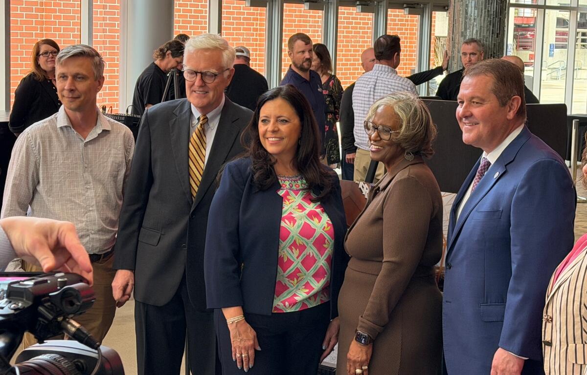 LEFT TO RIGHT: Jay Shanle, Downtown Springfield, Inc., Sangamon County Board Chair Andy Van Meter, Mayor Misty Buscher, State Sen. Doris Turner, State Rep. Mike Coffey