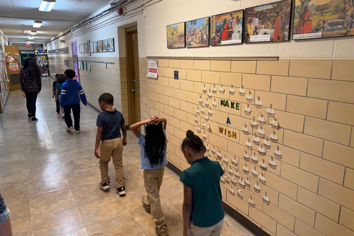 Students walk down the hallway of St. Patrick Catholic School Thursday, March 5, 2026.