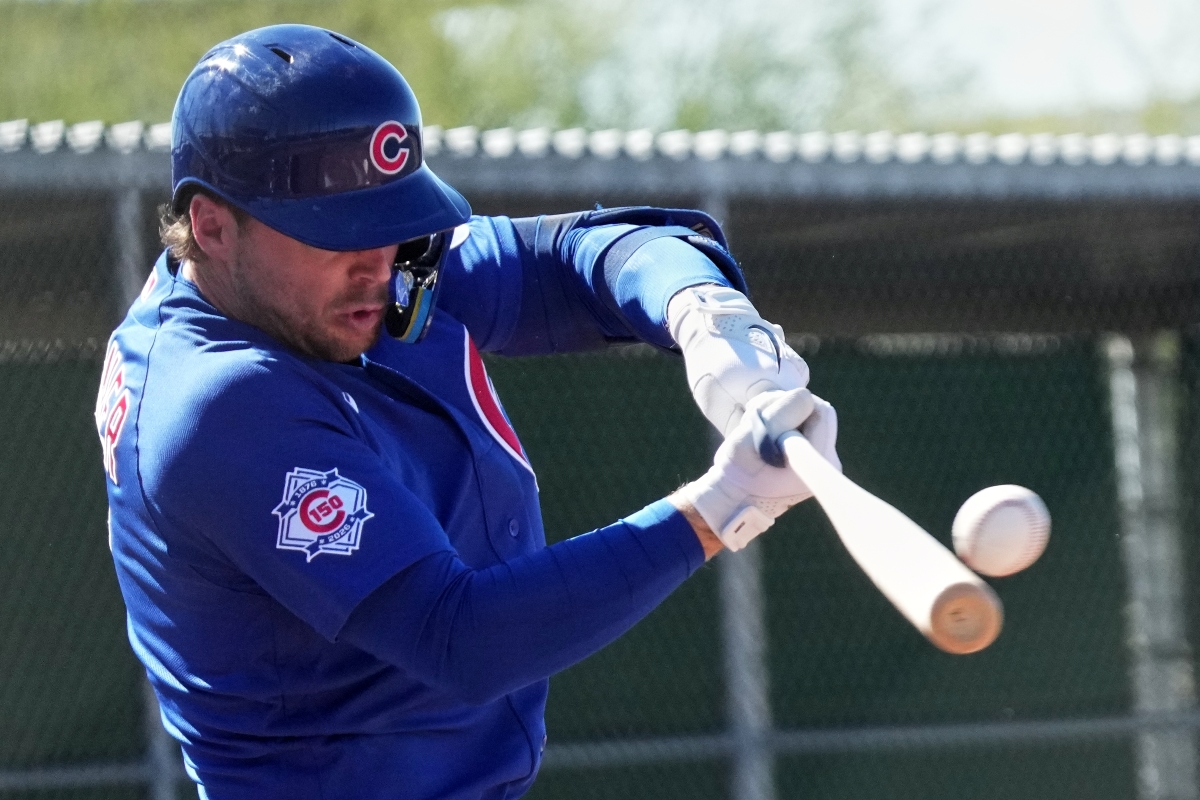 Chicago Cubs' Nico Hoerner hits during a spring training baseball workout Saturday, Feb. 14, 2026, in Mesa, Ariz. (AP Photo/Morry Gash)
