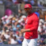 St. Louis Cardinals manager Oliver Marmol walks back from the mound after making a pitching change during the second inning of a spring training baseball game against the New York Mets Friday, Feb. 27, 2026, in Jupiter, Fla. (AP Photo/Jeff Roberson)