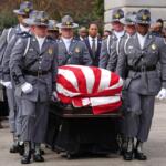 The casket of the Rev. Jesse Jackson is carried to the South Carolina Statehouse, where he will lie in state, Monday, March 2, 2026, in Columbia, S.C. (AP Photo/Matt Kelley, Pool)