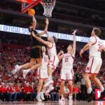 From left, Iowa's Alvaro Folgueiras shoots against Nebraska's Rienk Mast, Sam Hoiberg, Pryce Sandfort and Cale Jacobsen during the second half of an NCAA college basketball game Sunday, March 8, 2026, in Lincoln, Neb. (AP Photo/Rebecca S. Gratz)