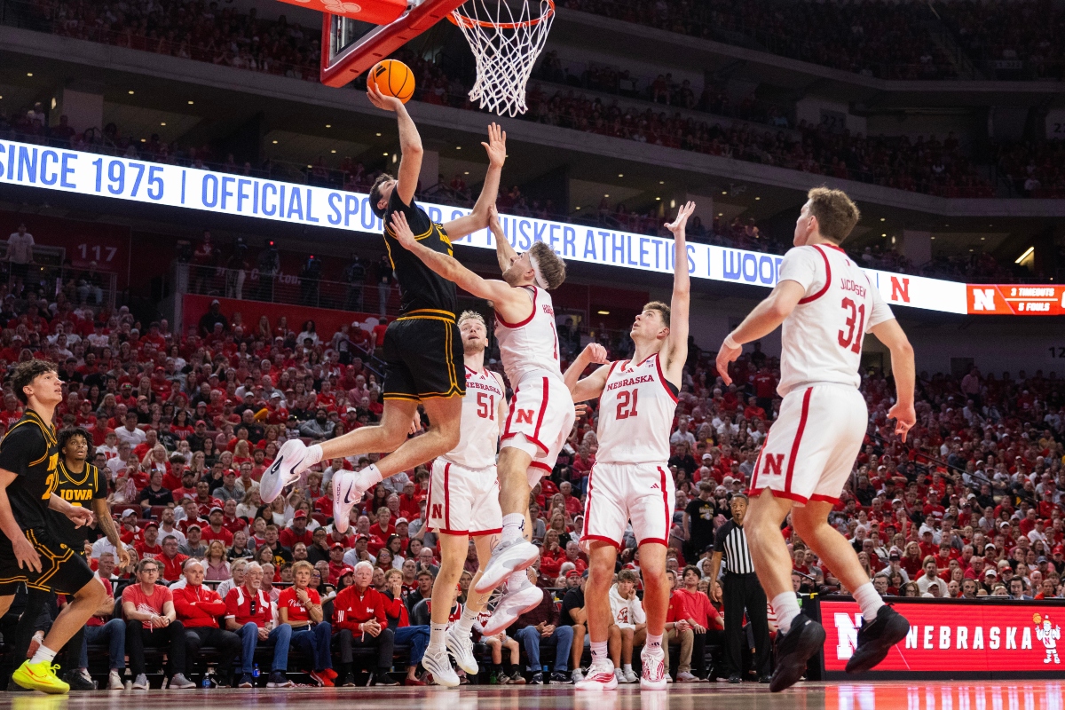 From left, Iowa's Alvaro Folgueiras shoots against Nebraska's Rienk Mast, Sam Hoiberg, Pryce Sandfort and Cale Jacobsen during the second half of an NCAA college basketball game Sunday, March 8, 2026, in Lincoln, Neb. (AP Photo/Rebecca S. Gratz)