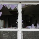 A window is damaged in the aftermath of a powerful storm that ripped through the area a day earlier in Kankakee, Ill., Wednesday, March 11, 2026. (AP Photo/Nam Y. Huh)