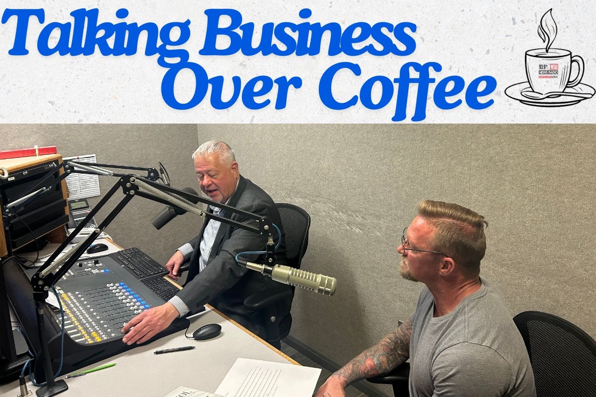 Chris Bullock, Capitol Media Group Vice President/General Manager, talks with Mark Chisholm of Performance Diagnostics, Driveline, & Fabrication in New Berlin.