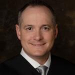 Madison County Associate Judge Andrew Carruthers found his name in the recently released U.S. Department of Justice files regarding Jeffrey Epstein, a sex offender accused of trafficking minors. Carruthers was assigned Epstein’s case in a collection matter in Lake County, Illinois, but said he never met him or communicated with him.