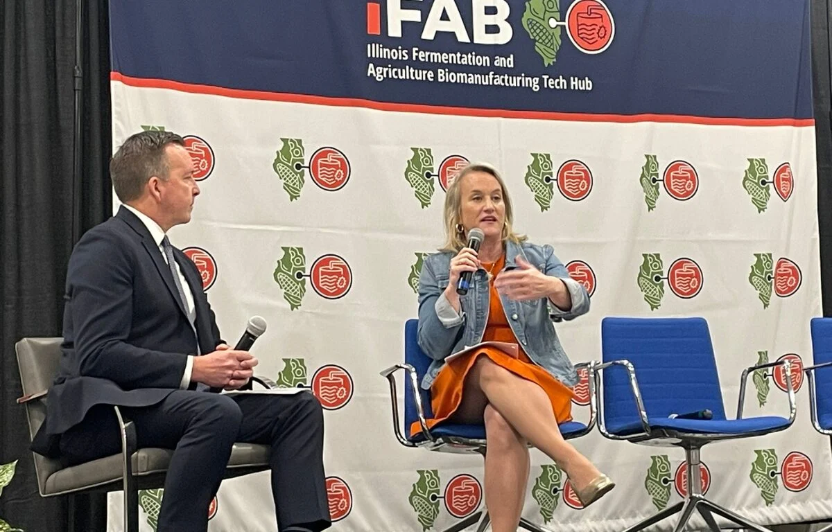 Deputy Governor Andy Manar (left) and U.S. Rep. Nikki Budzinski (D-Springfield) speak Wednesday in Champaign.