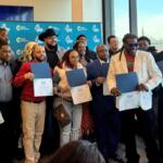 Graduates of the Waukegan Climate and Equitable Jobs Act hub pose for a picture after their commencement ceremony on Feb. 27, 2026, at the College of Lake County’s lakeshore campus. (Medill Illinois News Bureau photo by Reece Dower)