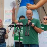 University of Illinois Springfield theatre professor and faculty union president Dathan Powell speaks at a news conference about the UIS faculty strike. Cheers erupted from the crowd as he spoke about his experiences bargaining with the university. (Capitol News Illinois photo by Jenna Schweikert)