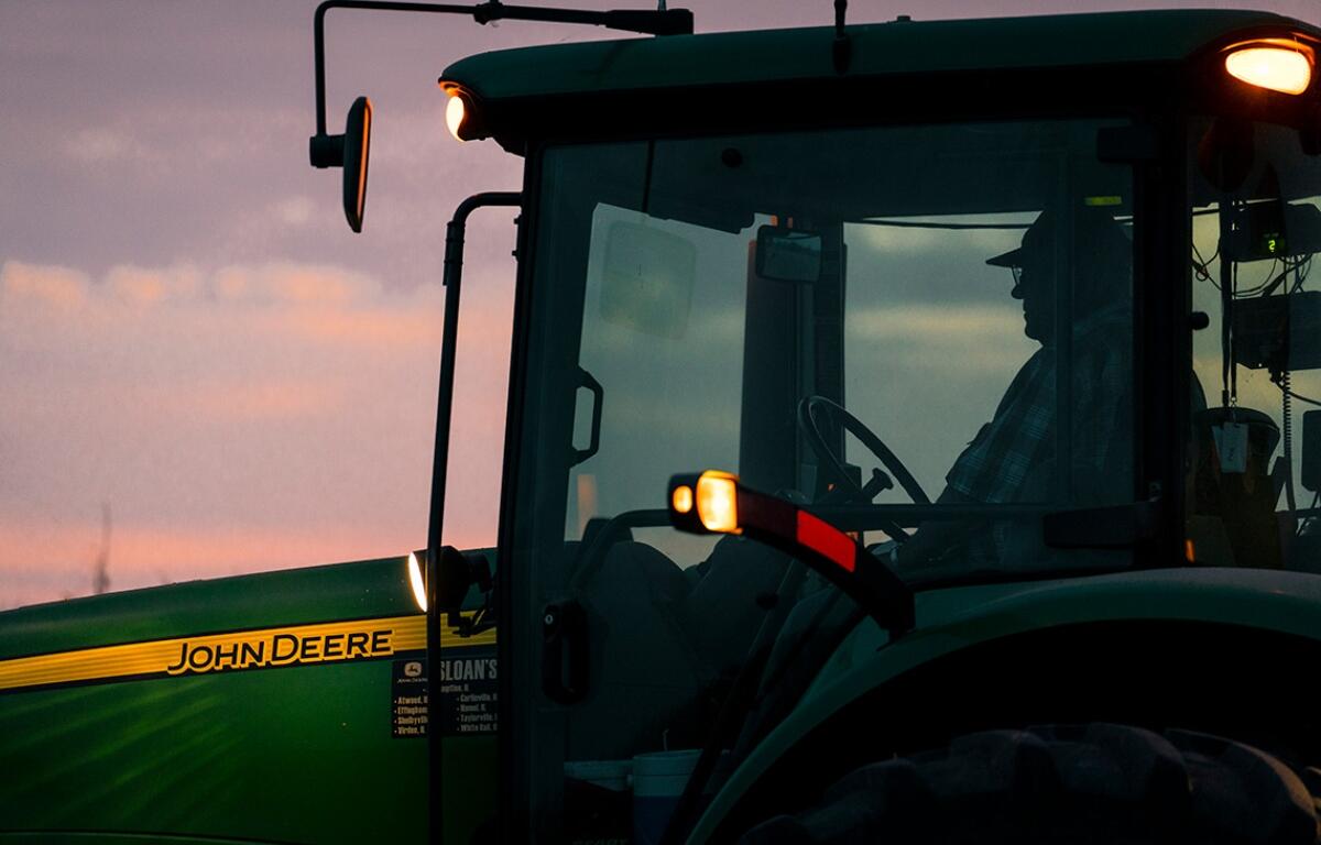 A farmer works into the evening hours in Macon County, Illinois. (Photo courtesy of Muirhead Farms)