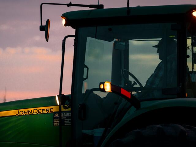 A farmer works into the evening hours in Macon County, Illinois. (Photo courtesy of Muirhead Farms)