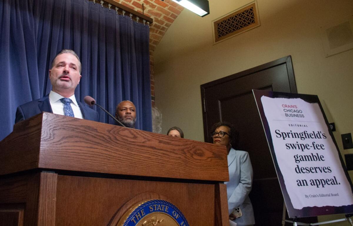 Ben Jackson of the Illinois Bankers Association urges lawmakers to repeal a state law that prohibits financial institutions from charging fees on the tax and tip portion of debit card transactions. (Capitol News Illinois photo by Jerry Nowicki)