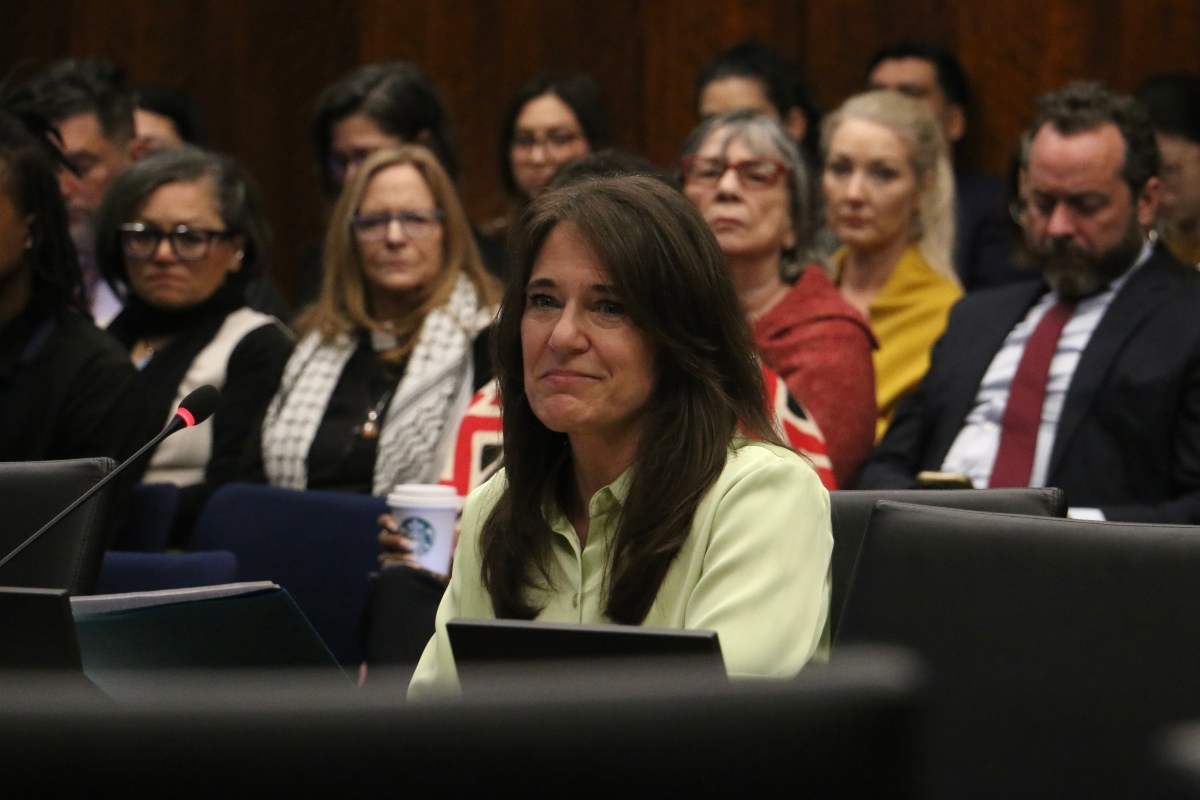 Denise Lorence, mother of Katie Abraham, says during an April 27 hearing of the Illinois Accountability Commission that her daughter should be remembered as the “empathetic and caring person she was,” not used to further the Trump administration’s political aims. (Capitol News Illinois photo by Maggie Dougherty)