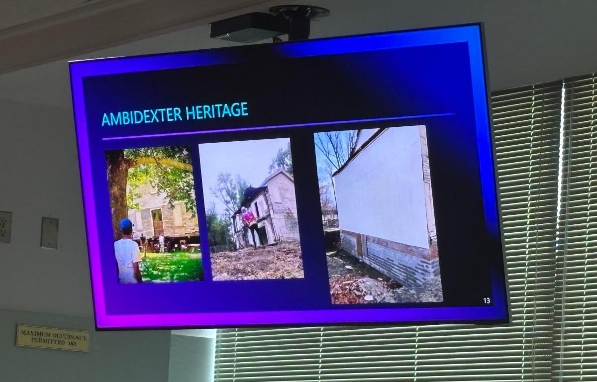 Slide titled 'Ambidexter Heritage' showing three photos of historic buildings with a purple border.