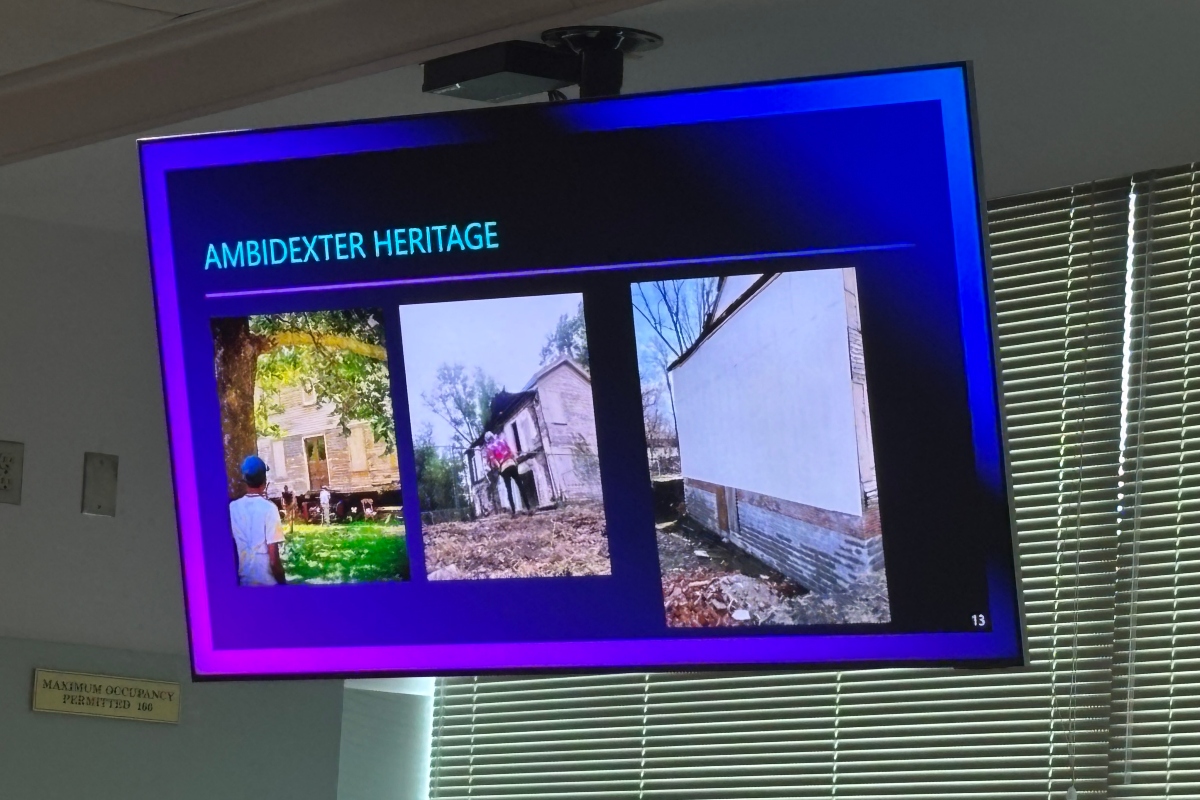 Slide titled 'Ambidexter Heritage' showing three photos of historic buildings with a purple border.