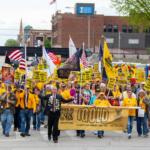 Participants in the annual Illinois Gun Owners Lobbying Day (IGOLD) march from the Bank of Springfield Center to the Illinois Capitol Wednesday, April 15.