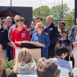 Springfield Public School Superintendent Jennifer Gill is joined by local leaders, Gov. JB Pritzker, and local student athletes Tuesday, April 28, at the ribbon-cutting for the new Scheels Sports Park.